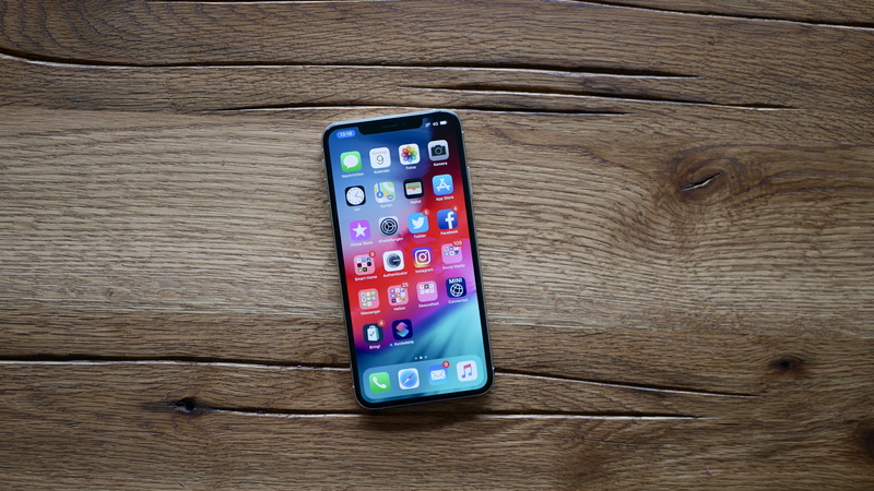 smart phone, speaker, smartphone, directly above, ipod, electronics, apple, hardwood, single object, no people, cake, connection, cell phone, close-up