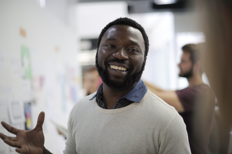 presentation, emotion, headshot, smiling, indoors, toothy smile, target, confidence, neck, present, looking at camera, happiness, people, boat, men, workshop