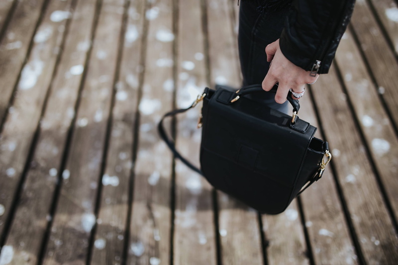 water, blonde, digital camera, luggage, pier, woman, human hand, wooden pier, real people, outdoors, suitcase, briefcase, pretty, low section, jetty, wood - material