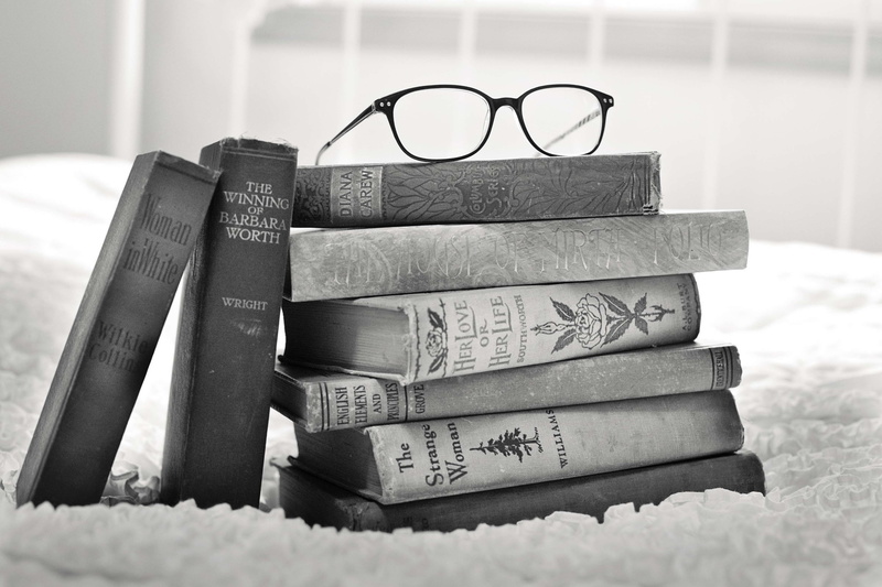 focus on foreground, text, vintage, hardcover book, indoors, stack, education, expertise, home interior, personal accessory, antique, 4K, reading, still life