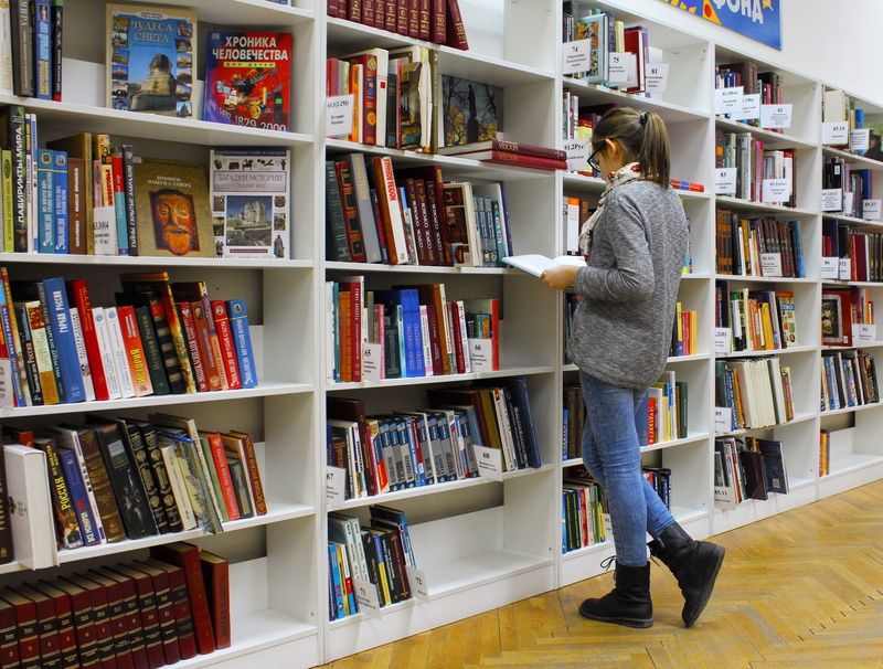 customer, development, collection, learning, order, standing, casual clothing, beautiful, knowledge, education, culture, archive, books, hairstyle, indoors