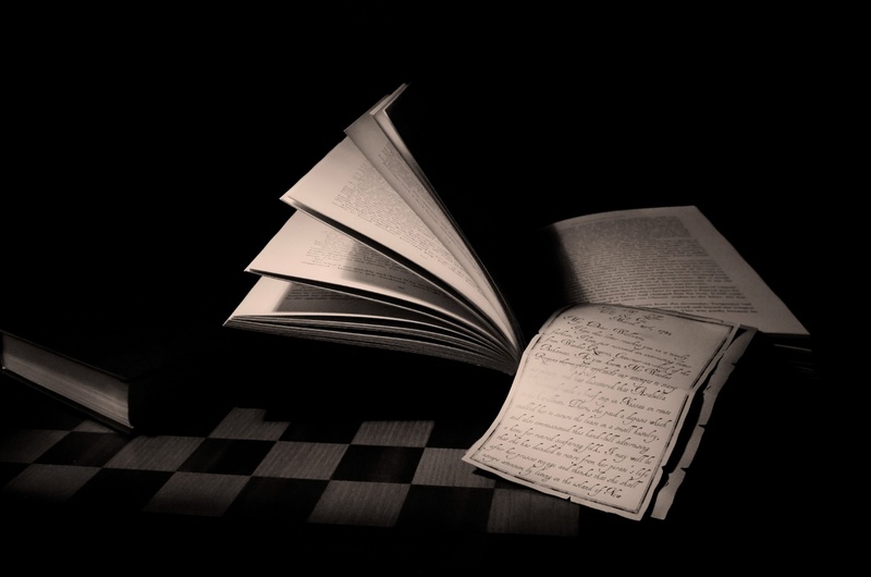 learning, literature, black, encyclopedia, no people, page, spine, reference, opened, copy space, religion, spirituality, expertise, black background, open