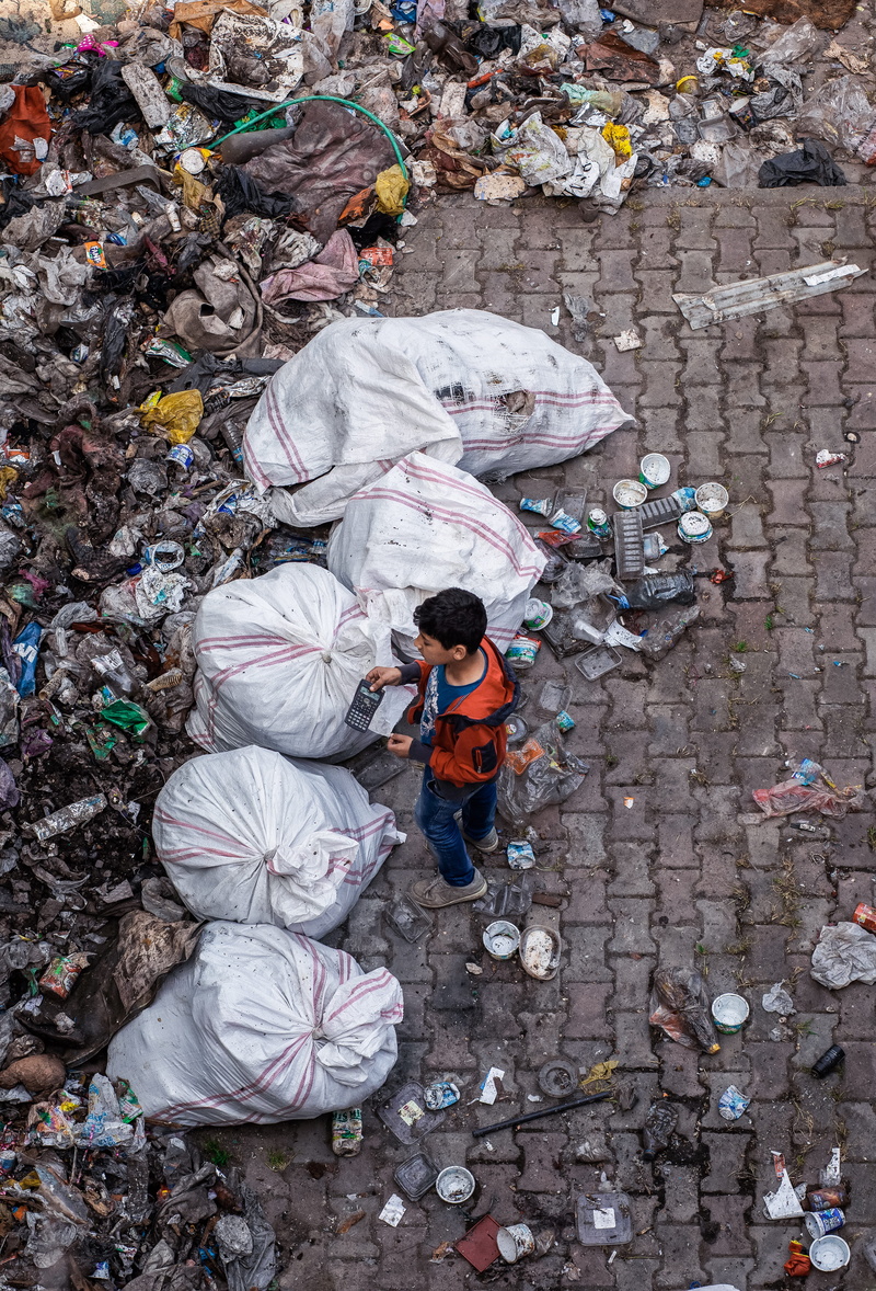 people, men, dump, waste, litter, trash, junk, adult, kid, casual clothing, real people, high angle view, disposal, hat, garbage, pollution, environment