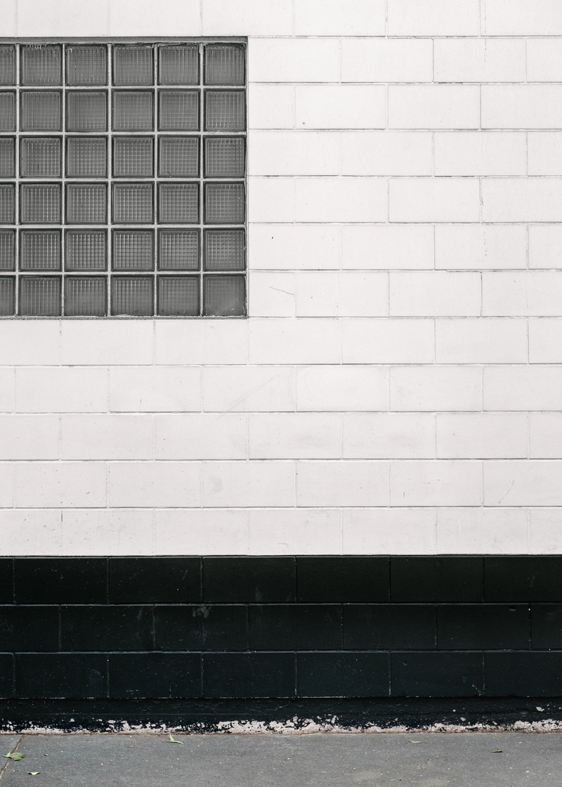 window, sunlight, wall - building feature, outside, nature, wall, brick, snowing, building, concrete, street, pattern, sidewalk, bricks, outdoors, day