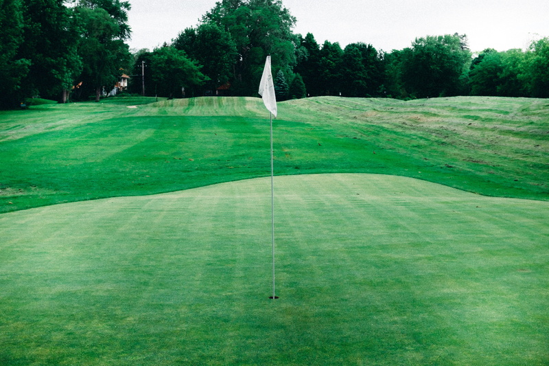 golf, no people, day, leisure activity, holiday, flag, tourism, lifestyle, club, field, golfing, competition, green - golf course, plant, countryside, copy space