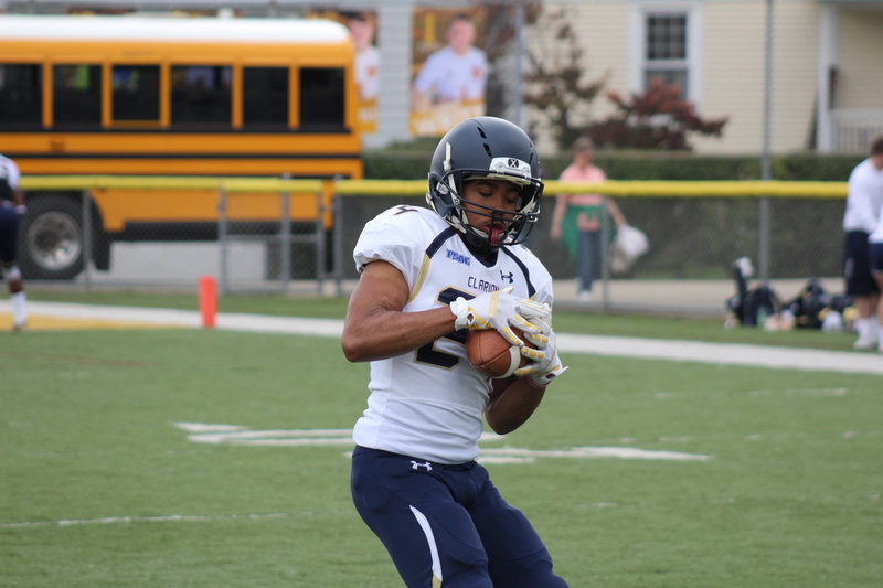 people, daytime, outfit, school bus, football player, football, player, men, american football - sport, teenager, wear, sport, child, headwear, ball, sports equipment