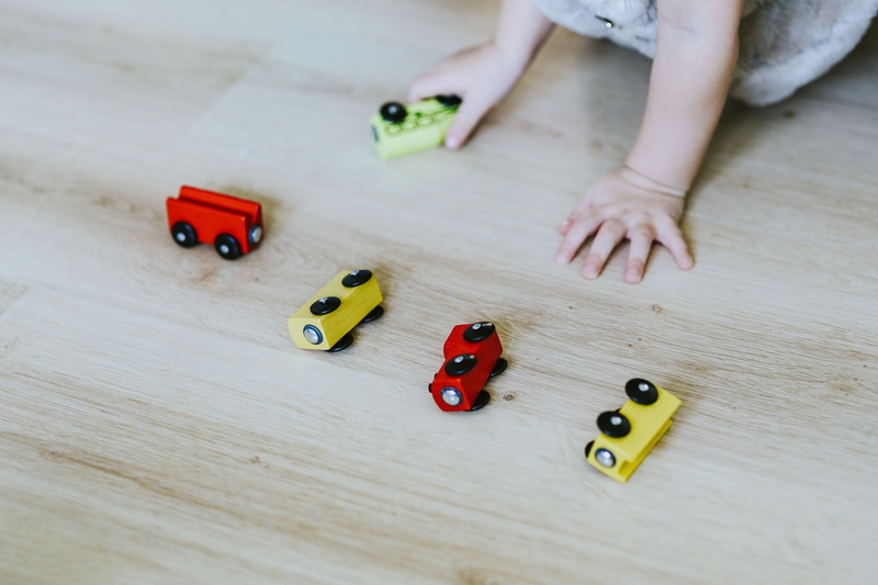 human Hand, toy car, people, play, Child, offspring, car, human foot, close-up, table, toy, flooring, leisure activity, childhood, fun, representation