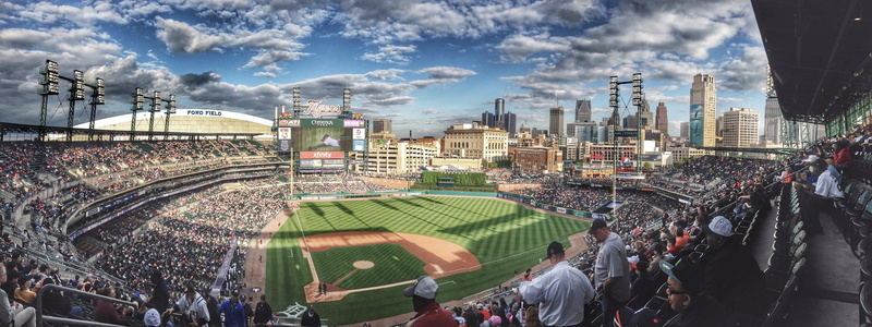 spectator, field, leisure activity, seats, ballgame, sunny, baseball field, real people, cityscape, photo, lifestyles, building exterior, sky, city, outdoor