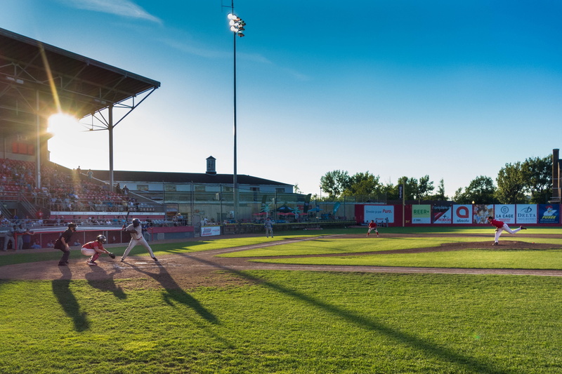 field, stadium, sports Venue, daytime, baseball, 4K, sunlight, plant, outdoors, shadow, soccer field, sky, people, sun, built structure, playing, competitive Sport