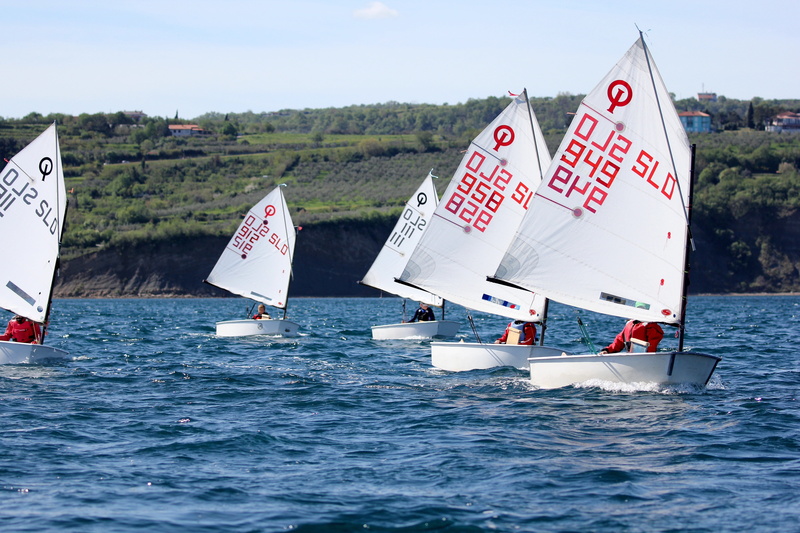 flag, no people, western script, race, nautical vessel, rippled, sky, motion, young, day, water, sailing, mode of transportation, transportation, sport