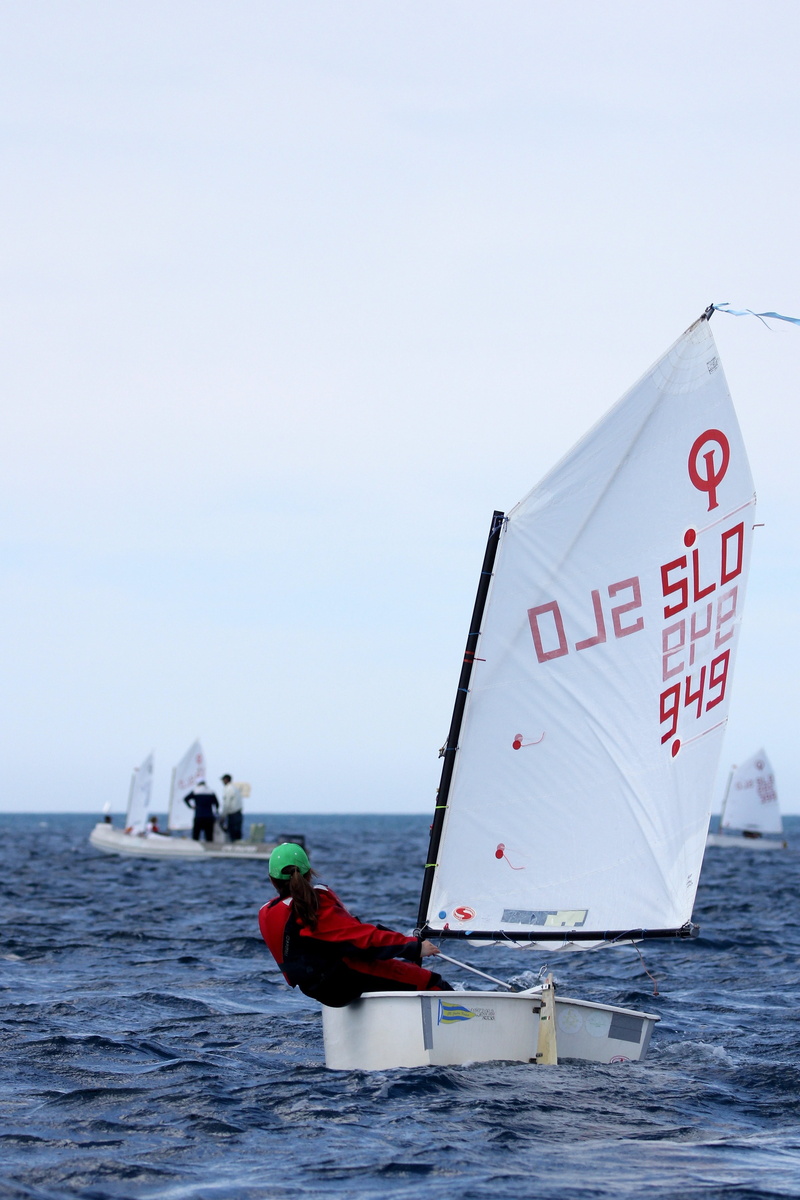 transportation, adventure, nature, day, outdoors, text, real people, leisure activity, race, water, nautical vessel, lifestyles, optimist, sky, sport, sailboat