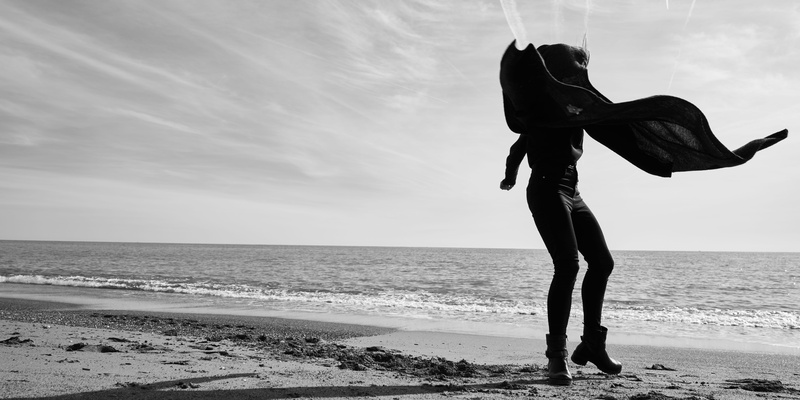 full length, one person, adult, portrait, ladies, leisure activity, day, outdoors, sea, nature, lifestyles, fashion, motion, young, beauty in nature, black and white