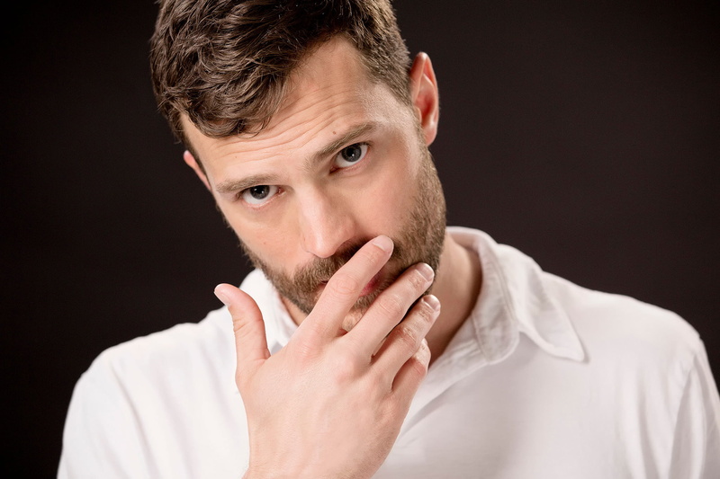 facial Expression, indoors, pensive, contemplation, human body part, face, copy Space, hand, front view, looking, jamie dornan, males, close-up, male Beauty