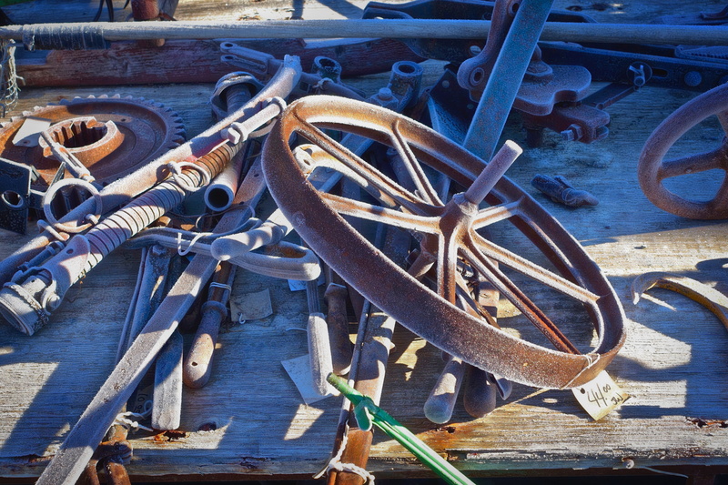 outdoors, decline, transportation, wheel, blue, abandoned, mode of transportation, engineering, wood - material, damaged, sunlight, placed, day, rope, cogwheel