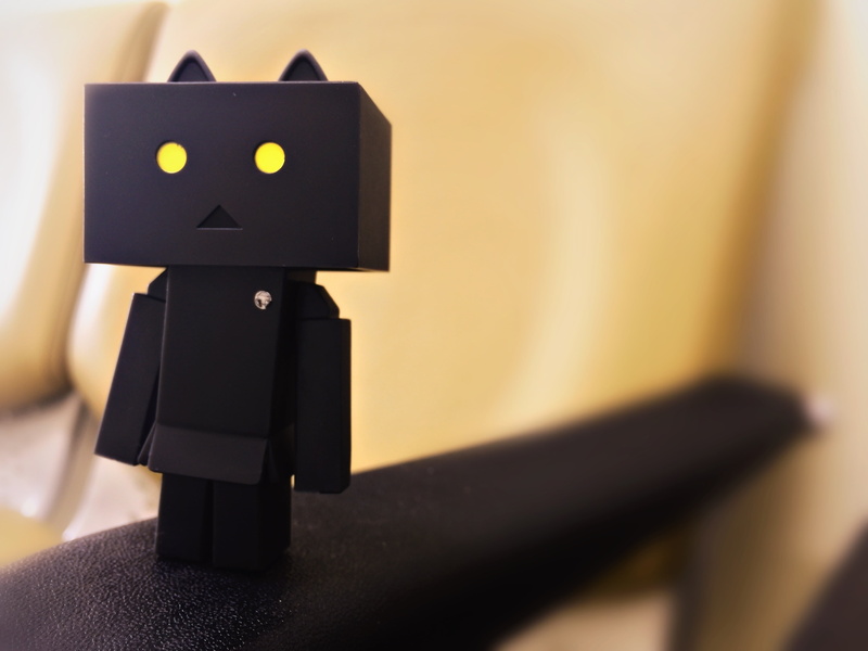 box, cardboard, danbo, robot, indoors, white, art and craft, representation, black, 4K, figurine, creativity, no People, selective focus, illuminated