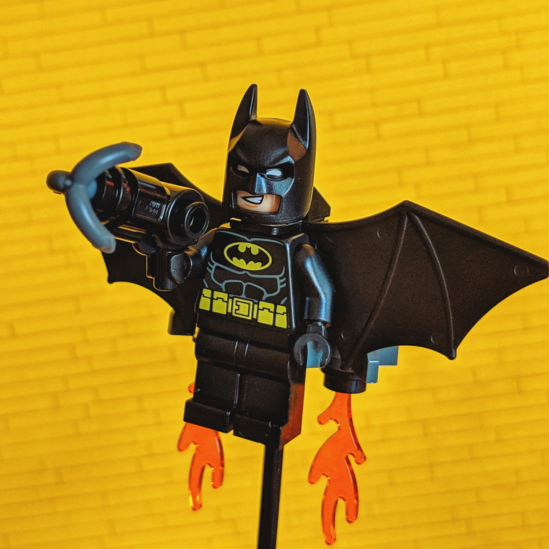 black color, united states, jetpack, wall - building feature, fire, security, day, animal, batman, minifigure, yellow background, yellow, no people, englewood