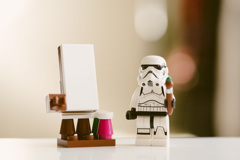 art, mini figure, star war, indoors, paint, paint brush, photography, painting, 5K, white, close-up, focus, selective, human representation, easel, macro