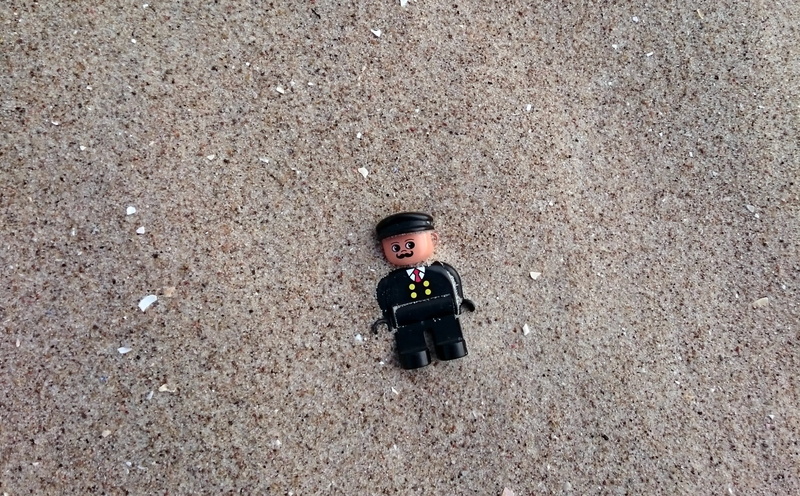 high angle view, day, Sand Beach, Toys, Minifig, looking at camera, real people, innocence, one person, 1080P, land, males, leisure activity, standing