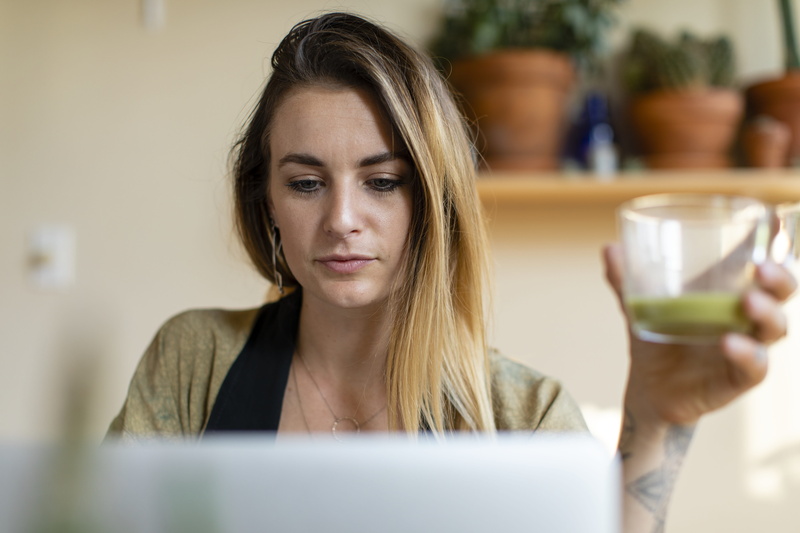 using laptop, portrait, digital device, drinking, digital, looking, checking, holding, digital nomad, refreshment, computer, headshot, drink, breakfast