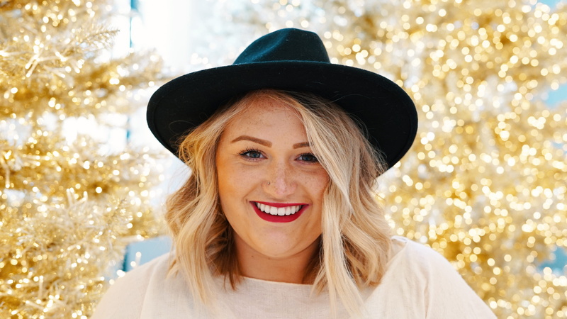 face, hat, woman, one person, hair, cheerful, apparel, cowboy hat, tree, black, toothy smile, lip, mouth, blond hair, hairstyle, headshot, happiness, white