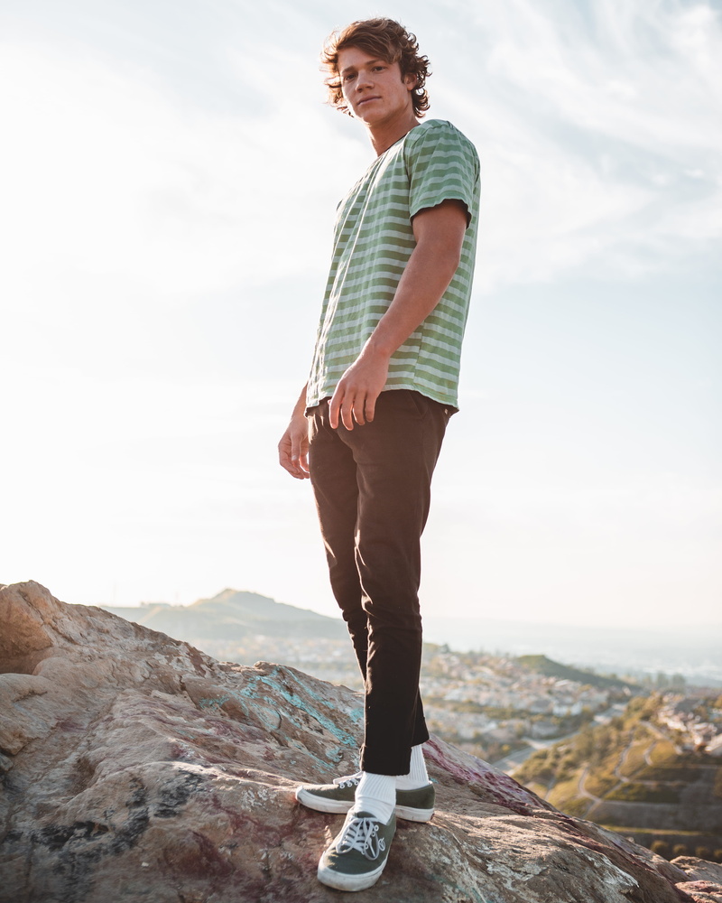 lifestyles, looking at camera, person, sleeve, jeans, casual clothing, influencer, clothing, portrait, sky, young adult, los angeles, footwear, nature