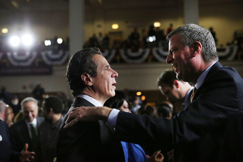 men, incidental people, well-dressed, formal, andrew cuomo, portrait, mature adult, focus on foreground, black, waist up, adult, 2015, 2K, togetherness