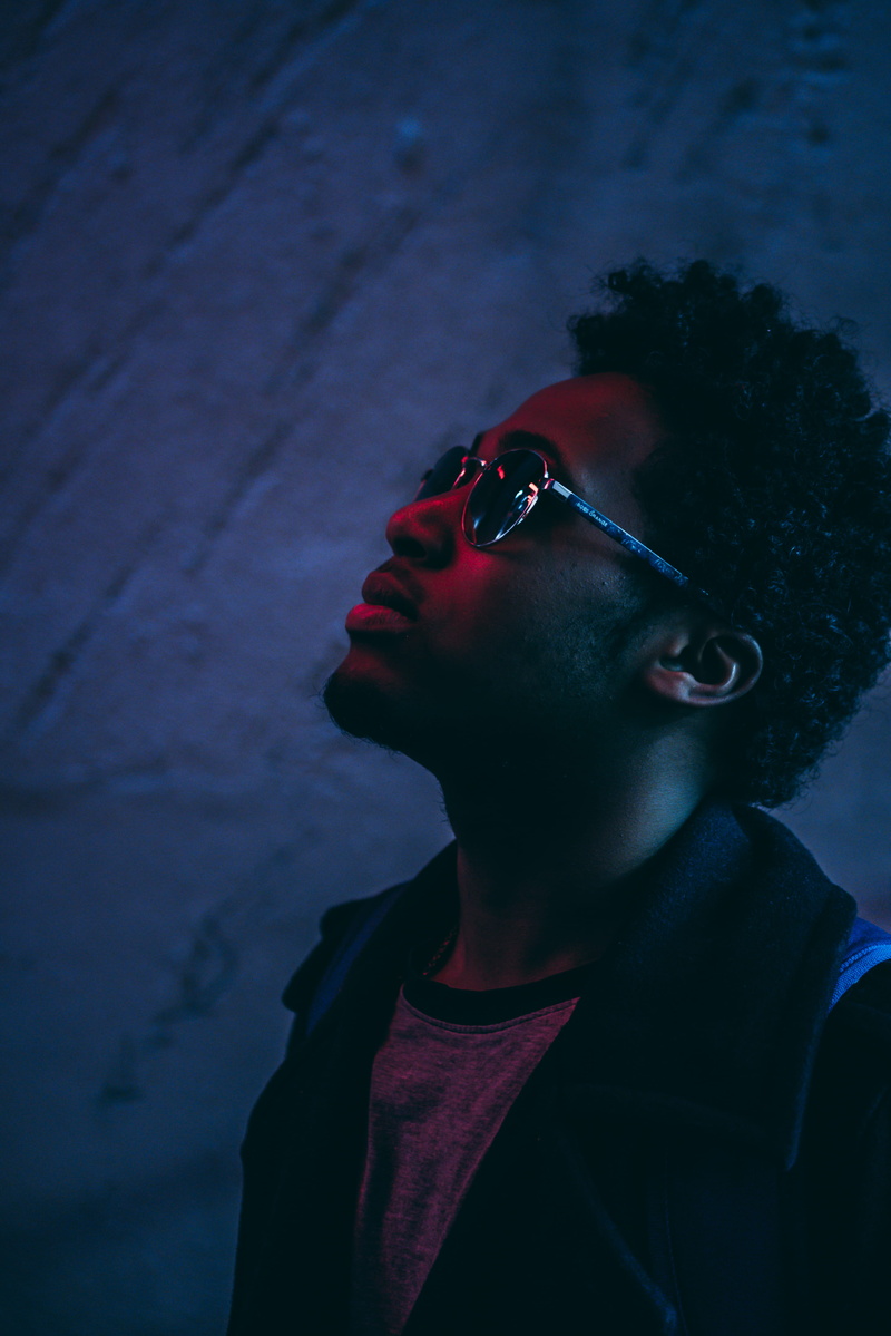 leisure activity, ebony, casual clothing, one person, glasses, man, headshot, eyeglasses, young men, night light, red, neon light, outdoors, 4K, african american