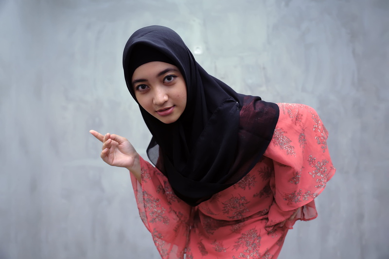 fashion, gray, young adult, scarf, casual clothing, portrait, focus on foreground, wearing, hairstyle, wall, lifestyles, pretty, headscarf, girl, looking at camera