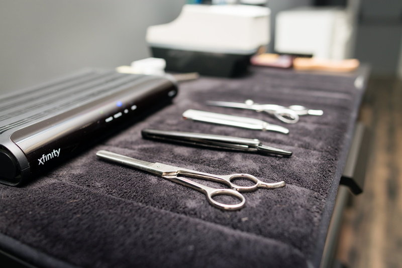haircut, close-up, indoors, scissors, selective focus, hair salon, hairdressing, group of objects, finance, sign, hair stylist, consumerism, still life