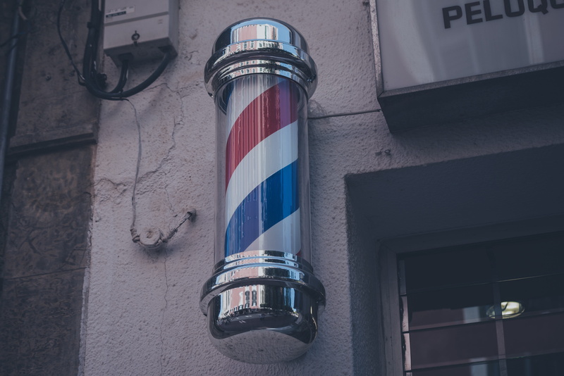 lighting equipment, electric lamp, building, red, near, outdoors, window, pole, no people, sign, building exterior, barber, shape, flag, barbershop, built structure