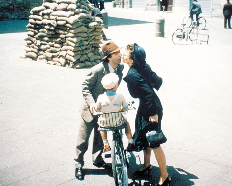 city, togetherness, young adult, winter, street, heterosexual couple, long, bicycle, ethnicity, roberto benigni, color Image, activity, guido, architecture
