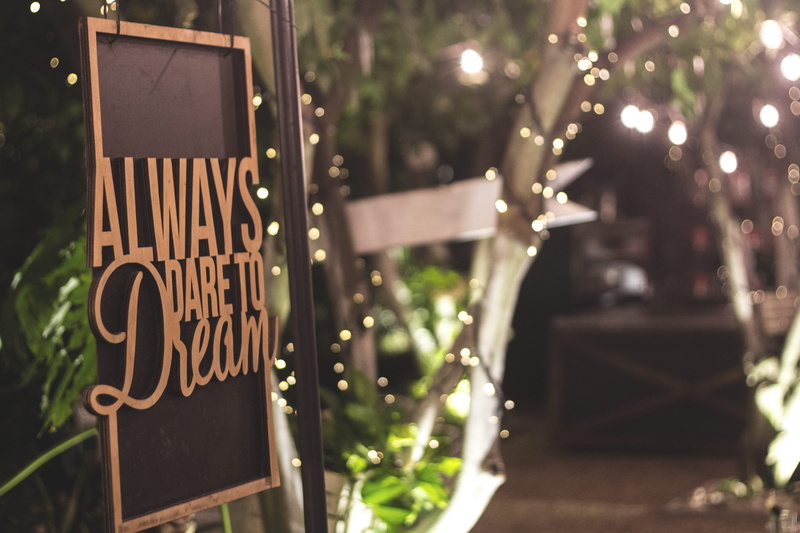 information sign, western script, quotes, sunlight, sign, architecture, information, selective focus, day, close-up, type, no people, lens flare, wood