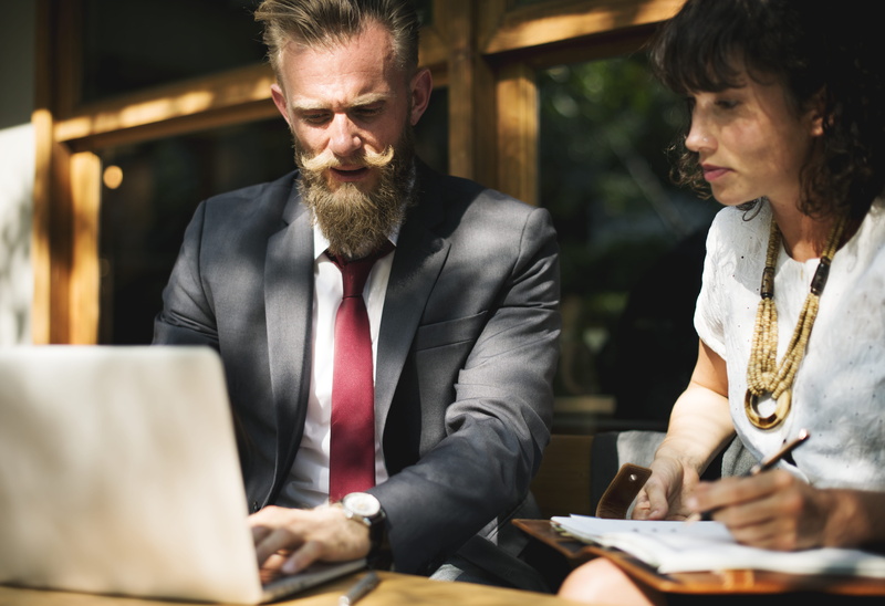 woman, collaboration, black, remote work, working, men, professional occupation, serious, males, wear, colleagues, using laptop, busy, macbook, jacket