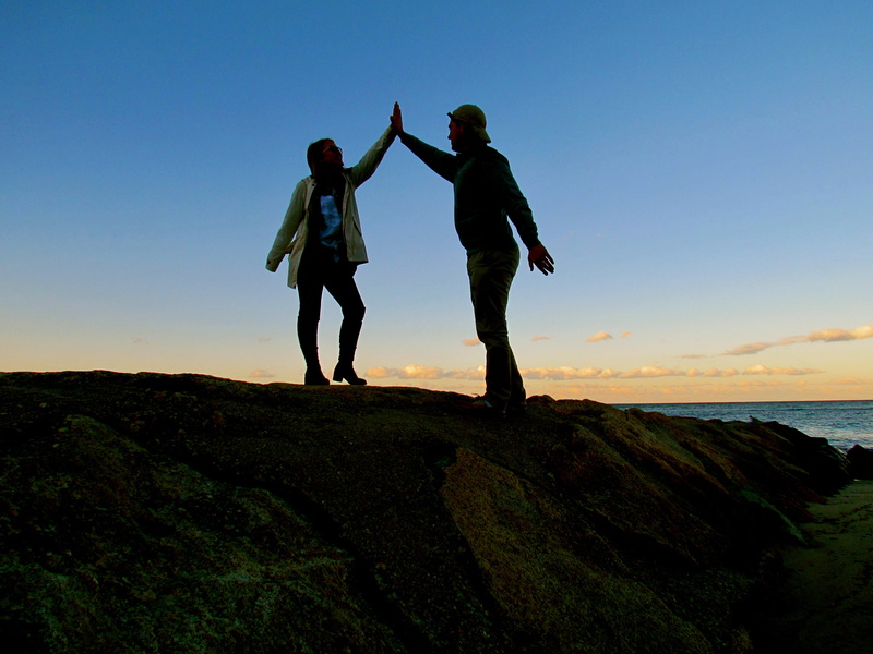 tranquility, silhouette, rock, together, men, success, celebrate, help, sunset, togetherness, human arm, couple, full length, beach, nature, scenics - nature