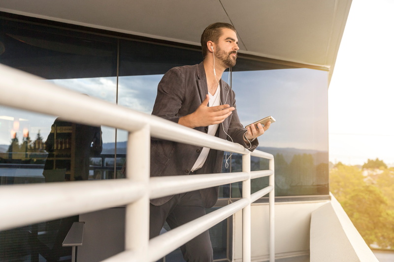 metal, modern, business, 5K, low angle view, young adult, architecture, sales person, work, holding, young men, balcony, technology, sales pro, looking