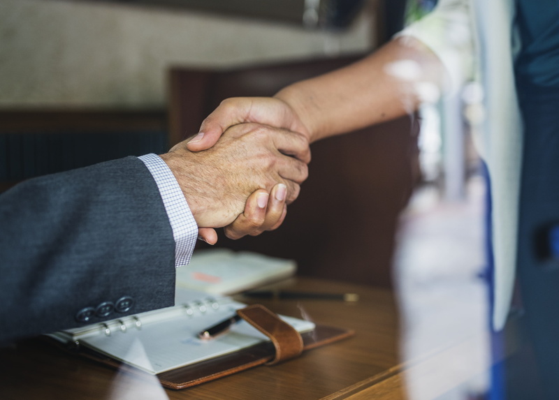 handshake, caucasian, american, human body part, businesswoman, marketing, business, selective focus, lifestyles, indoors, two people, businessman, adult