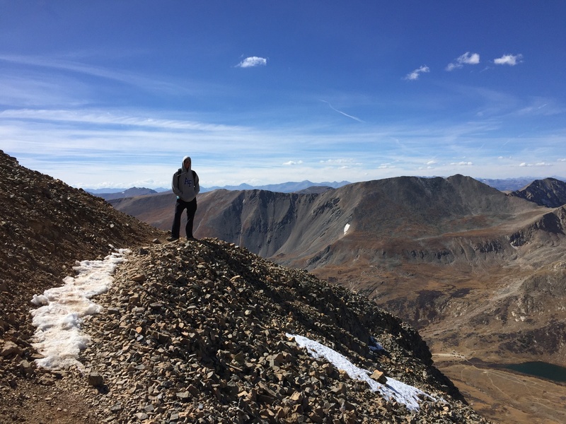 beauty in nature, mountain, day, one person, mountain top, accomplishment, men, achieve, adventure, landscape, cloud - sky, environment, activity, mountain Peak