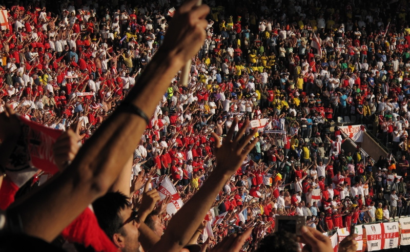 group of people, Sports, outdoors, human body part, positive emotion, soccer, 2K, red, limb, excitement, human arm, large group of people, arms raised