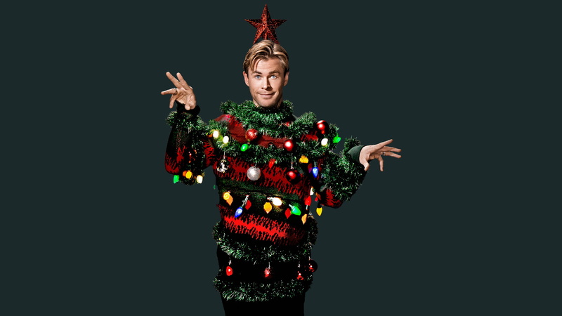 studio shot, lights, looking at camera, tree, Mary Ellen Matthews, SNL, decoration, standing, celebration, one person, portrait, arms raised, clothing