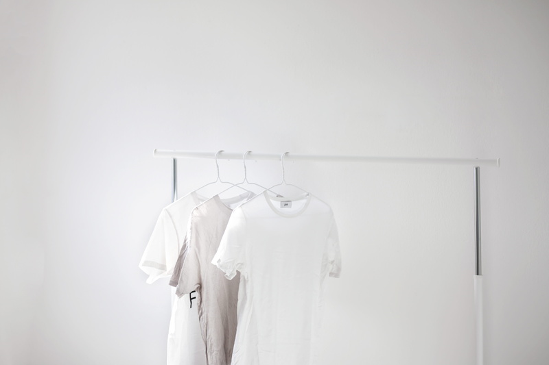 t shirt, coathanger, clothes rack, business, rack, no people, top - garment, copy space, capsule wardrobe, hanging, wall - building feature, shirt, clothing rail