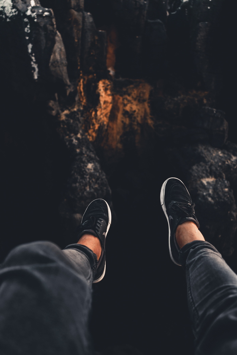 shoe, low, over, nature, top, one Person, men, dark, wearing, lifestyles, leg, human Hand, sneakers, males, close-up, reef, deep, rock, texture, human Leg