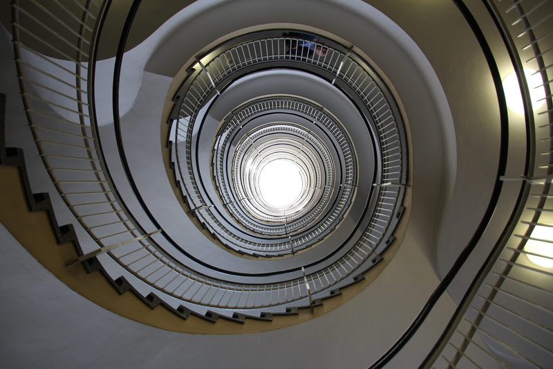 indoors, railing, architecture, geometric shape, light, structure, directly below, stairs, geometric, no people, shape, handrail, art, high, design, step