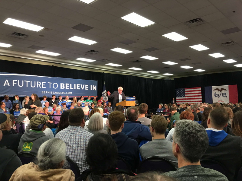 travel, crowd, text, adult, group of people, politics, illuminated, communication, real people, waiting, bernie sanders, architecture, indoors, politician