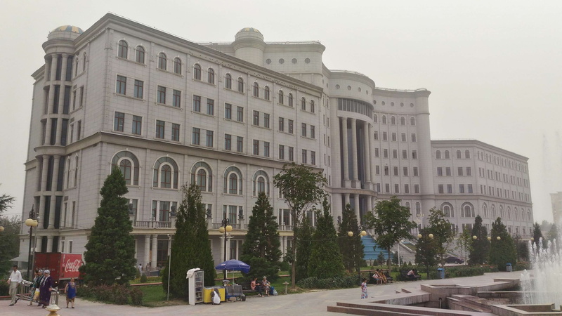 tree, land vehicle, architecture, city life, building, plant, city, incidental people, motor vehicle, group of people, dushanbe, mode of transportation
