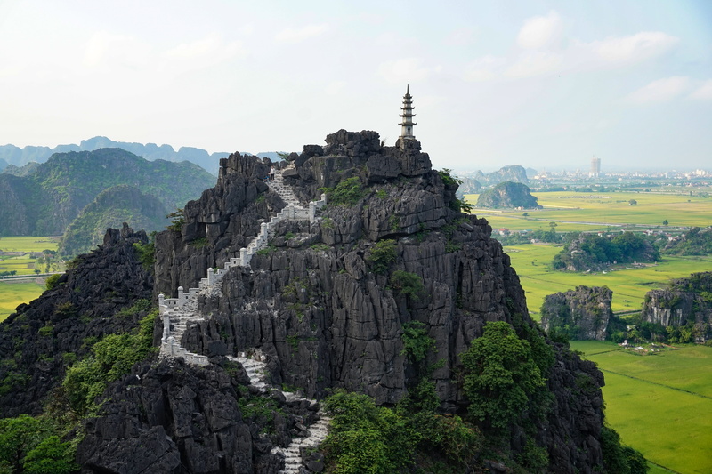tourism, tree, vietnam, trek, brown, outdoors, rice field, religious, solid, landscape, cliff, stair, white, summit, daytime, land, ninh bình, scenics - nature