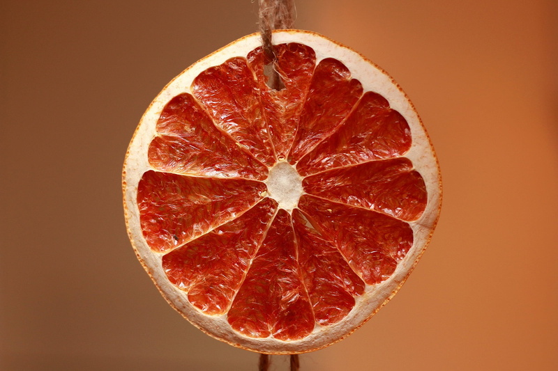 cross sectional, freshness, food, wellbeing, ripe, sliced, close-up, orange, juicy, studio shot, vitamin c, colored background, indoors, healthy lifestyle