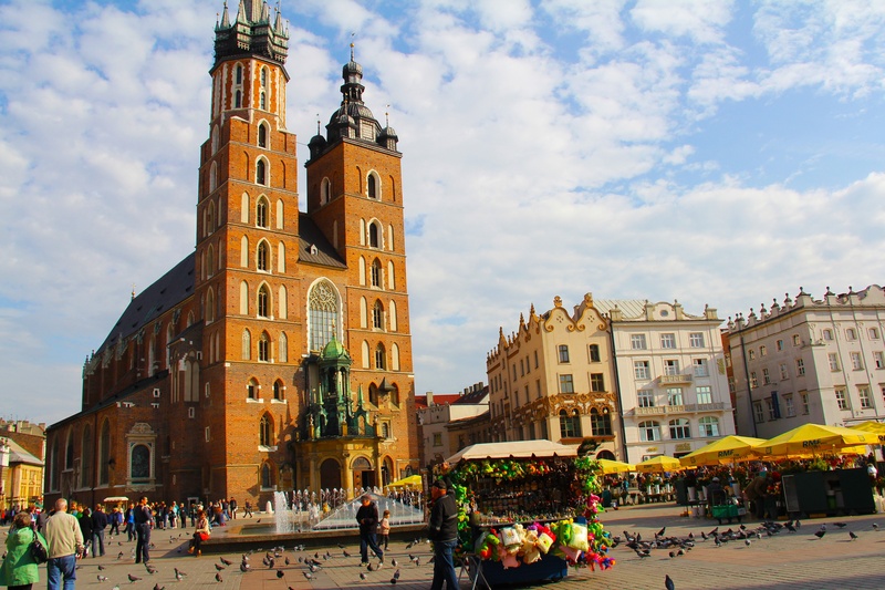 city, cloud - sky, crowd, tourism, church, nature, travel, outdoors, women, market square, real people, poland, old town, sky, krakow, men, cathedral, adult