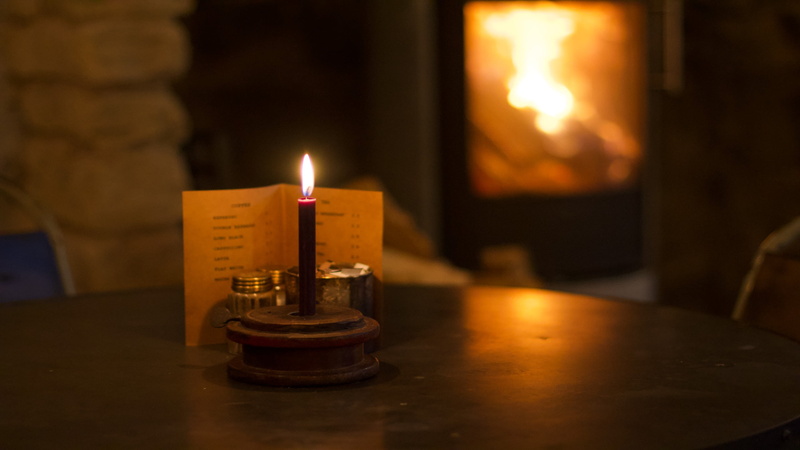 heat - temperature, close-up, electric lamp, candlestick holder, flame, burning, focus on foreground, table, selective focus, candles, candle, indoors