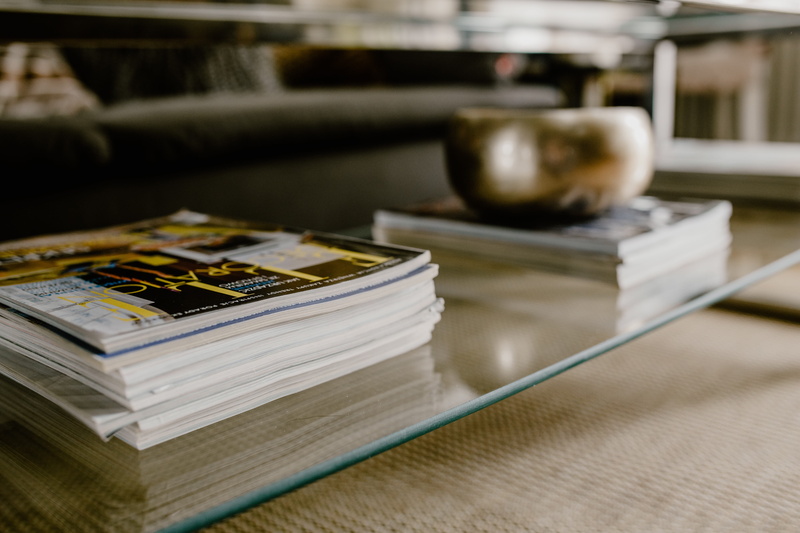 living, 5K, wealth, living room, focus on foreground, close-up, cozy, paper currency, no people, sofa, indoors, table, modern, group of objects, selective focus