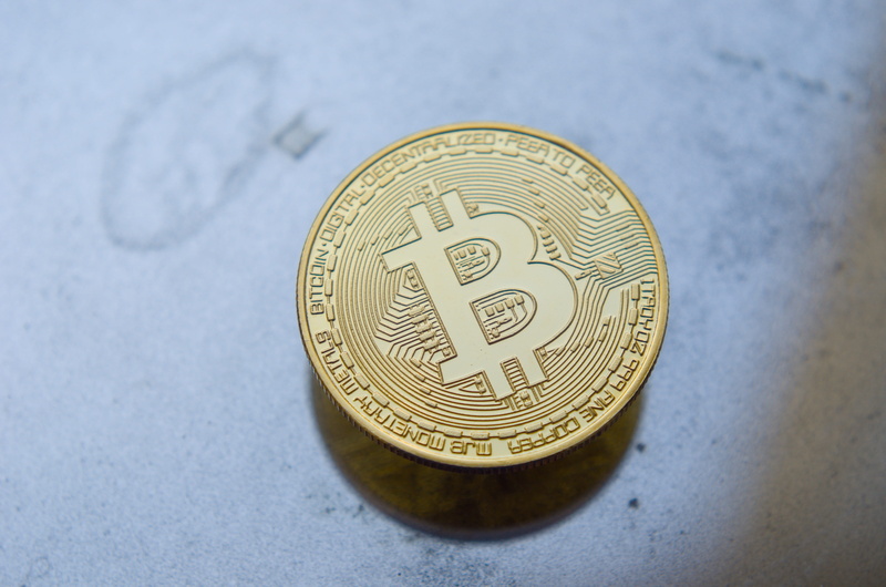 gold colored, high angle view, indoors, btc, bitcoin, single object, fortune, cryptocurrency, finance, krypto, studio shot, currency, business, shape, close-up